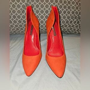 Reddish/orange high heels